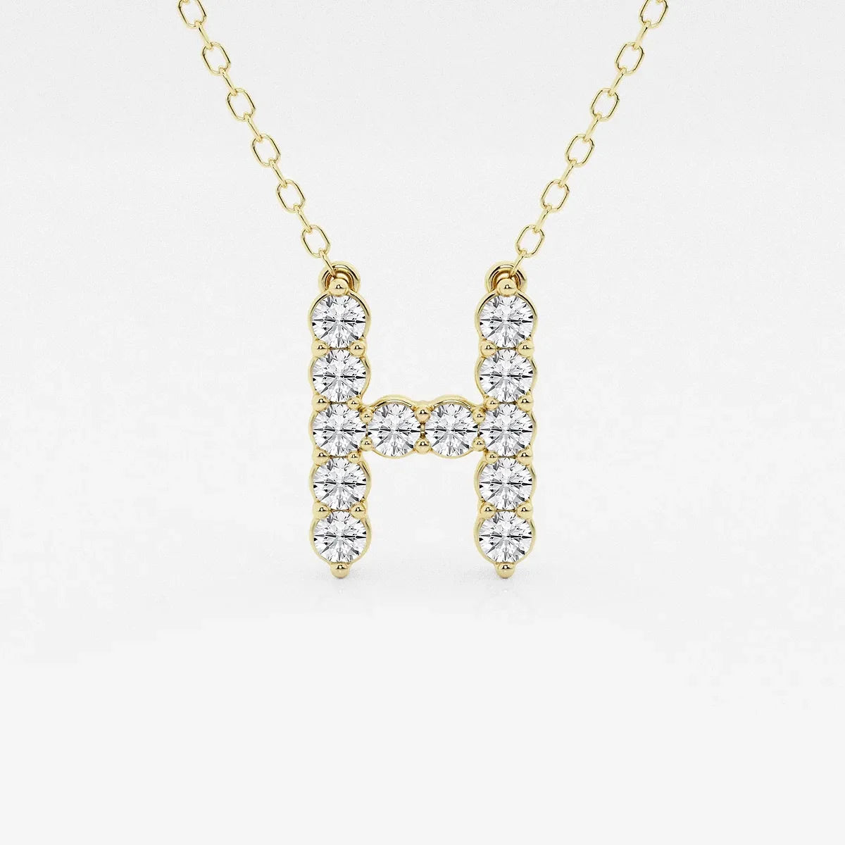 Yellow gold necklace with lab grown diamond initial H pendant from Delux Jewelry