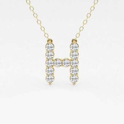 Yellow gold necklace with lab grown diamond initial H pendant from Delux Jewelry
