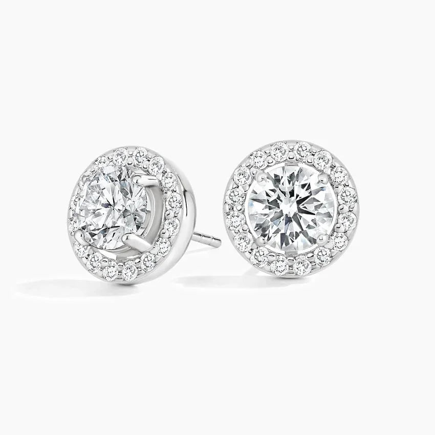 Lab grown diamond halo stud earrings in 14K white gold from Delux Jewelry on white background