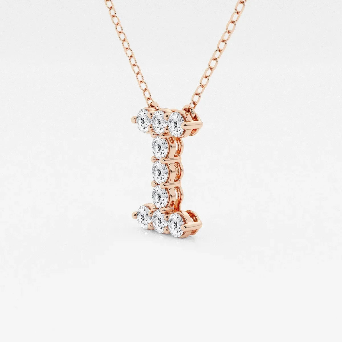 Rose gold pendant necklace with letter I, featuring round lab grown diamonds, Delux Jewelry