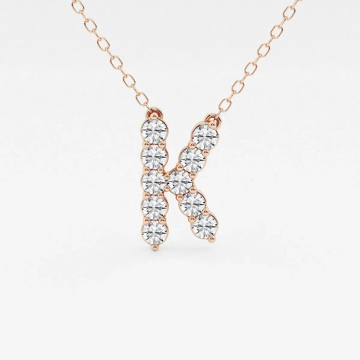 Rose gold pendant necklace with diamond letter K, Delux Jewelry lab grown diamond jewelry.