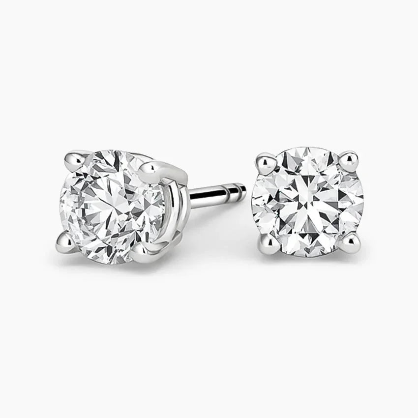Lab grown diamond stud earrings in 14K white gold from Delux Jewelry on white background