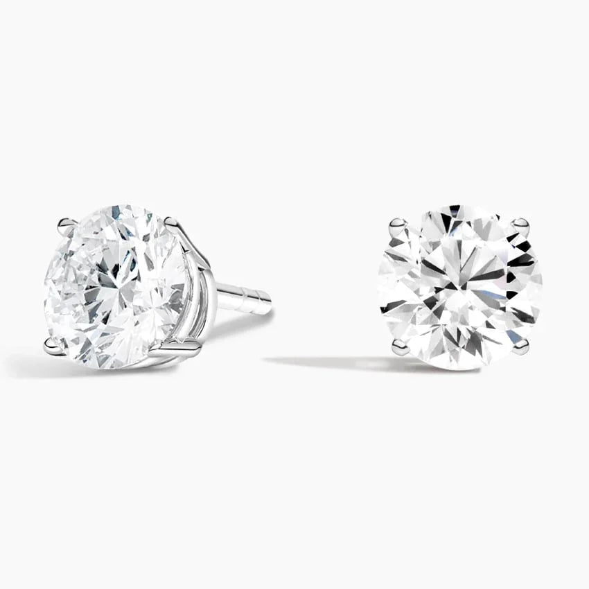 Lab grown diamond stud earrings in 14K white gold from Delux Jewelry on a white background