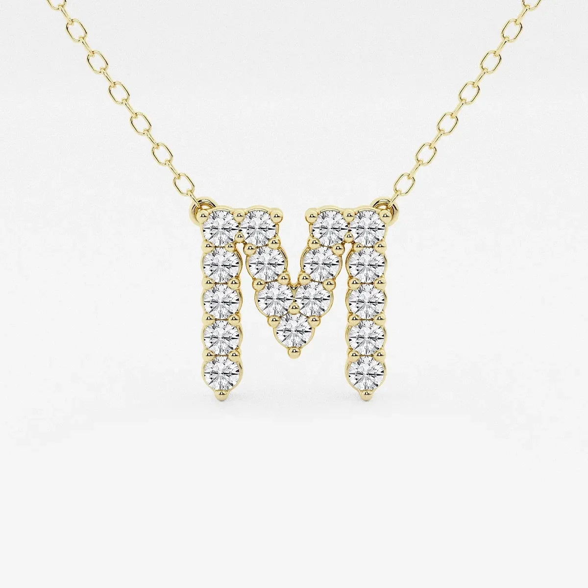 Gold necklace with lab grown diamond M initial pendant from Delux Jewelry