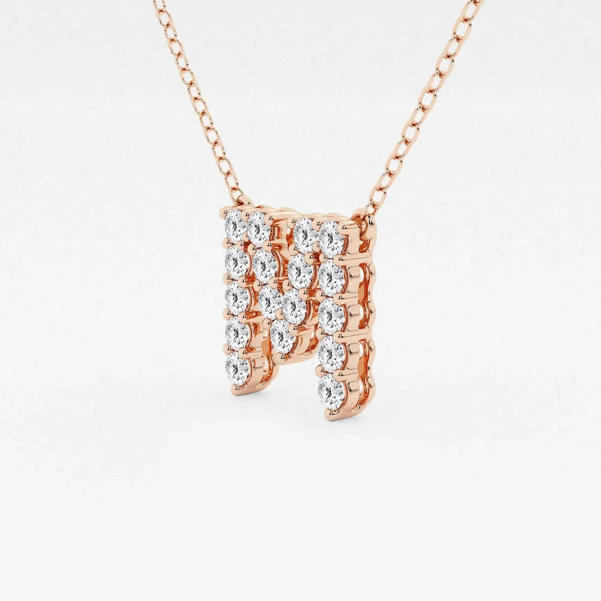 Yellow gold letter M pendant necklace with lab grown diamonds by Delux Jewelry