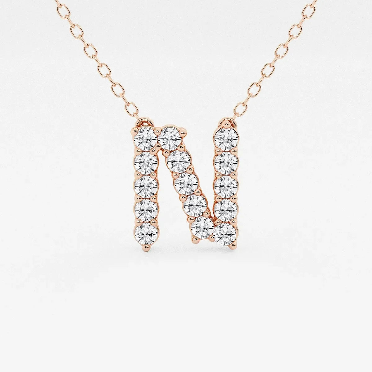 Rose gold necklace with lab grown diamond N initial pendant from Delux Jewelry