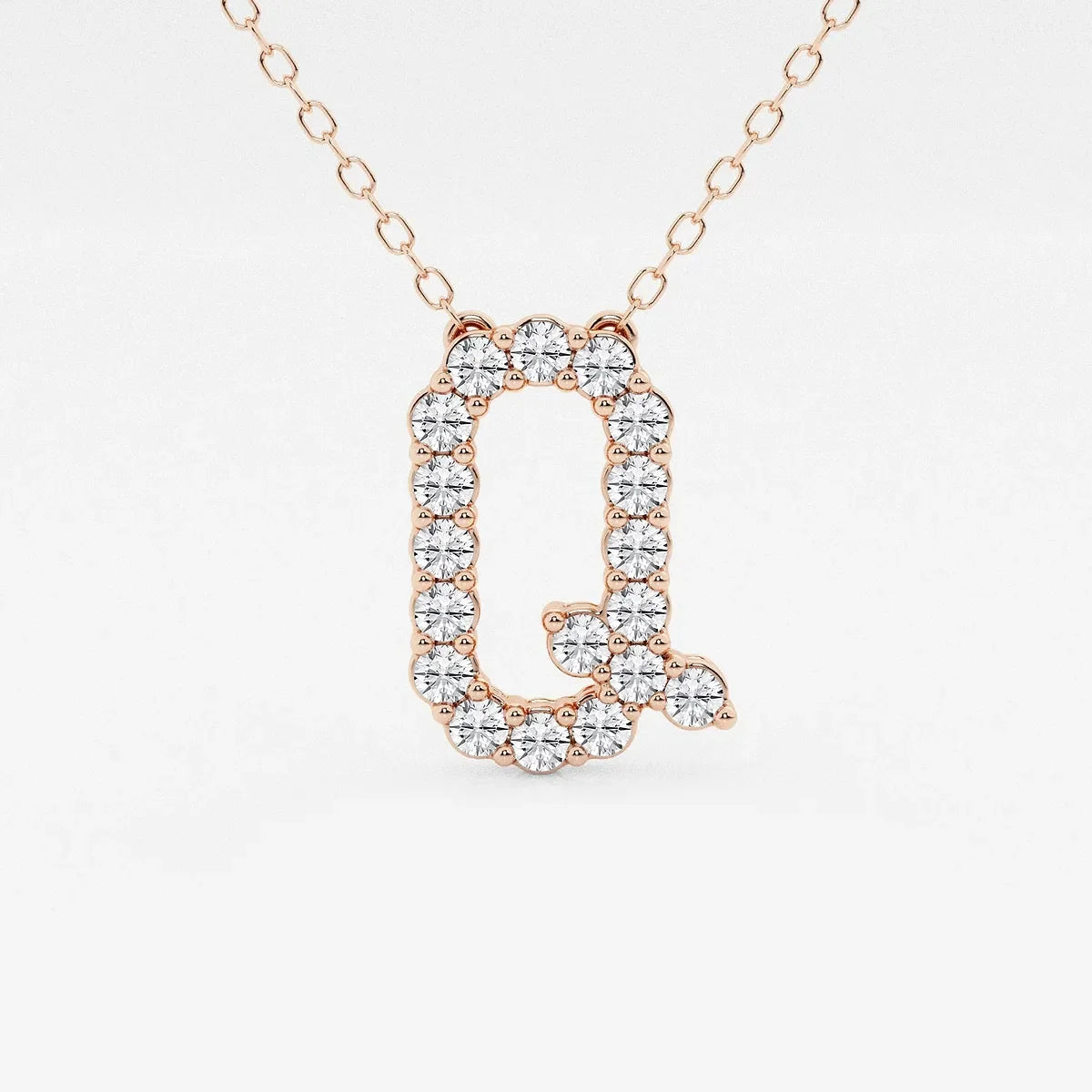 Rose gold pendant necklace with letter Q, set with lab grown diamonds from Delux Jewelry