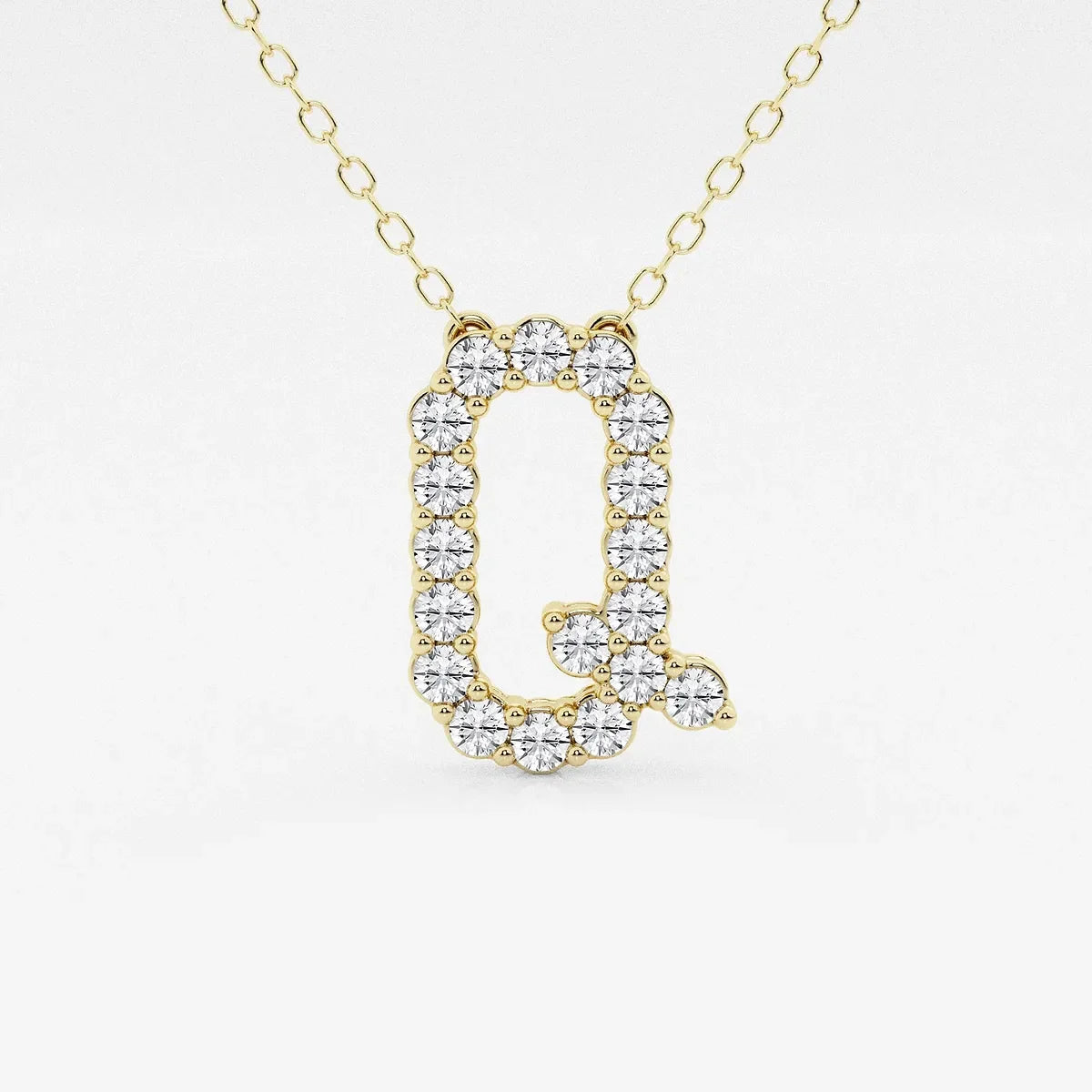 Yellow gold necklace with lab grown diamond Q initial pendant from Delux Jewelry