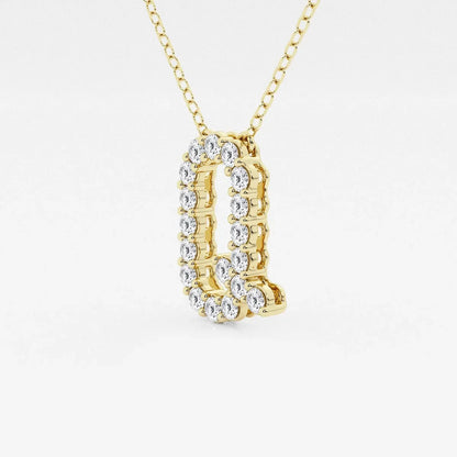 Gold pendant necklace with lab grown diamonds shaped as the letter Q from Delux Jewelry