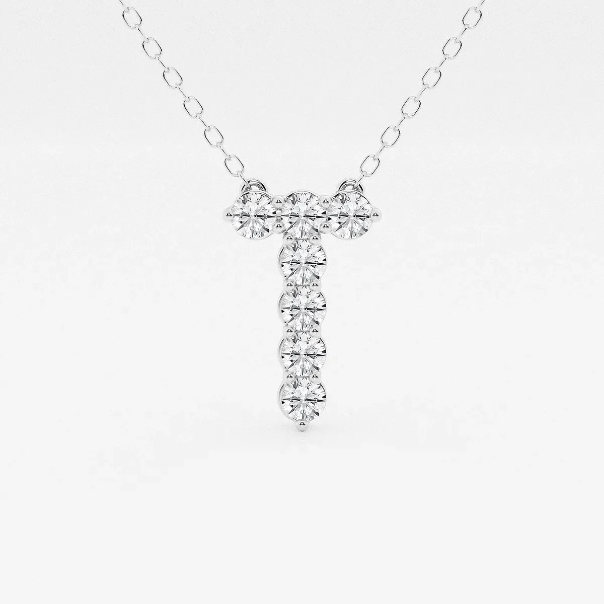 White gold pendant necklace with lab grown diamonds in a T shape from Delux Jewelry