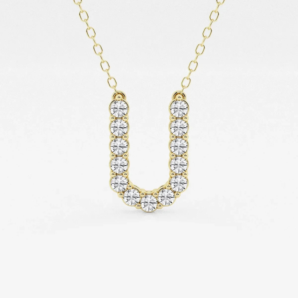 Gold pendant necklace with U-shaped lab grown diamonds from Delux Jewelry