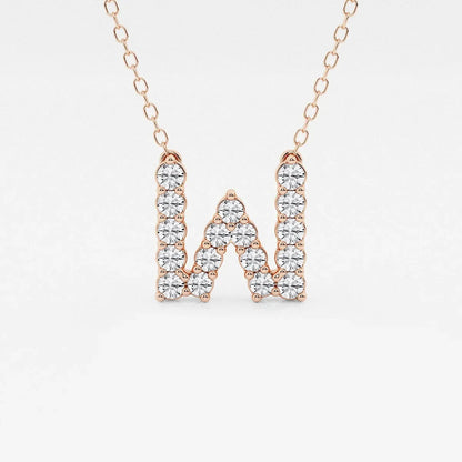 Rose gold necklace with lab grown diamond W initial pendant on a white background
