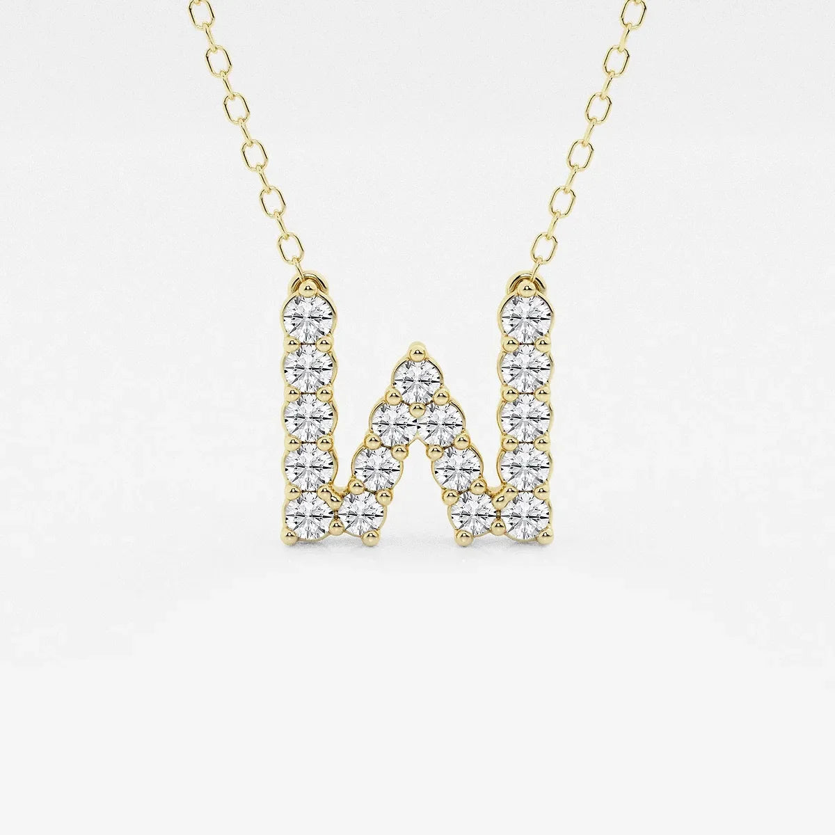 Gold necklace with W-shaped pendant adorned with lab grown diamonds from Delux Jewelry