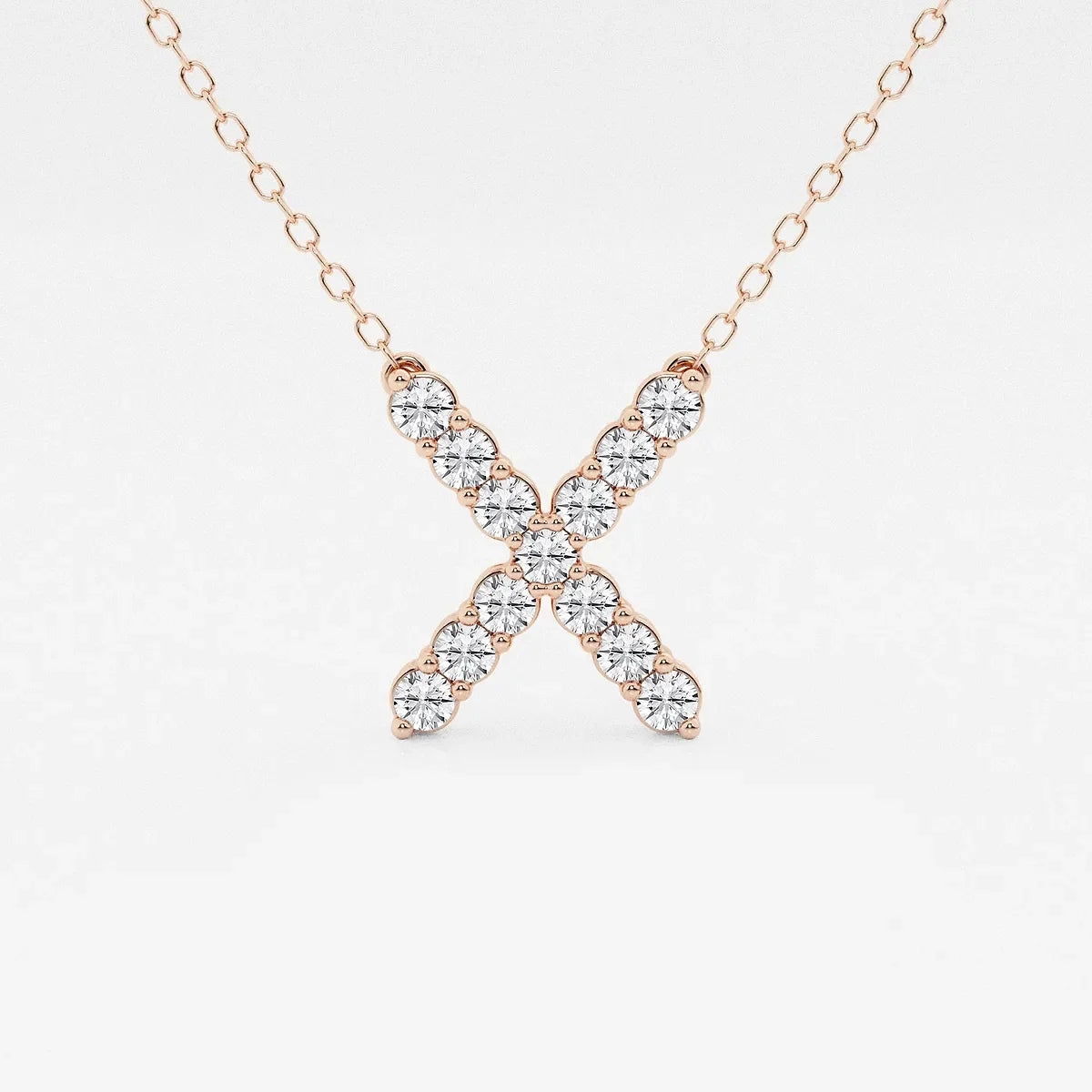 Rose gold X pendant necklace with lab grown diamonds on a delicate chain, Delux Jewelry