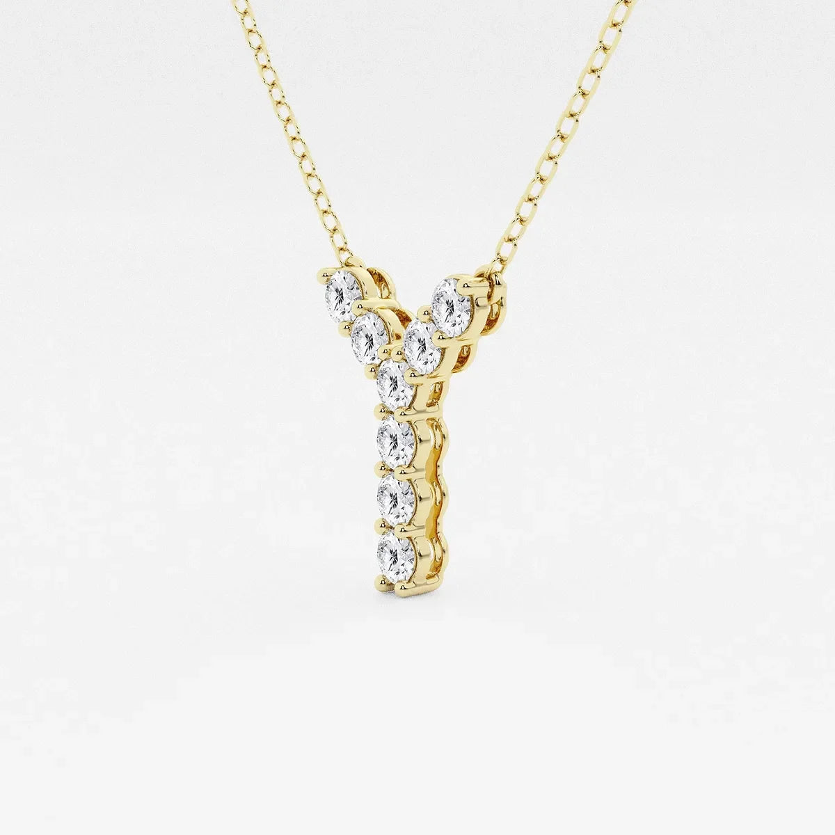 Yellow gold necklace with Y-shaped pendant set with round lab grown diamonds from Delux Jewelry.