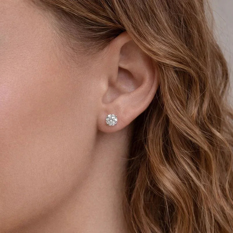 Woman wearing a Delux Jewelry lab grown diamond stud earring