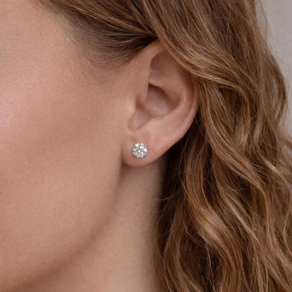 Woman wearing a Delux Jewelry lab grown diamond stud earring