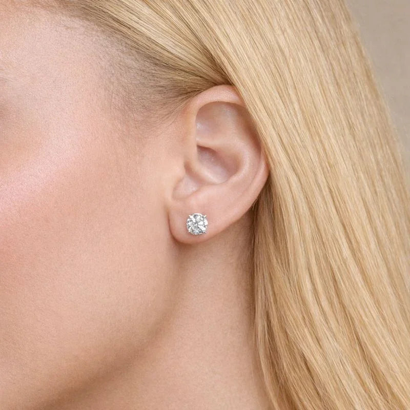 Lab grown diamond stud earring on ear, fine jewelry from Delux Jewelry
